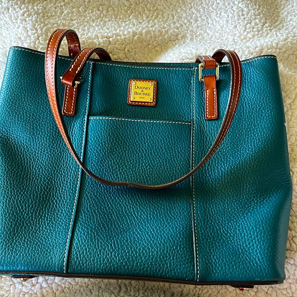 Authentic Dooney & Bourke Teal pebbled leather shoulder bag.